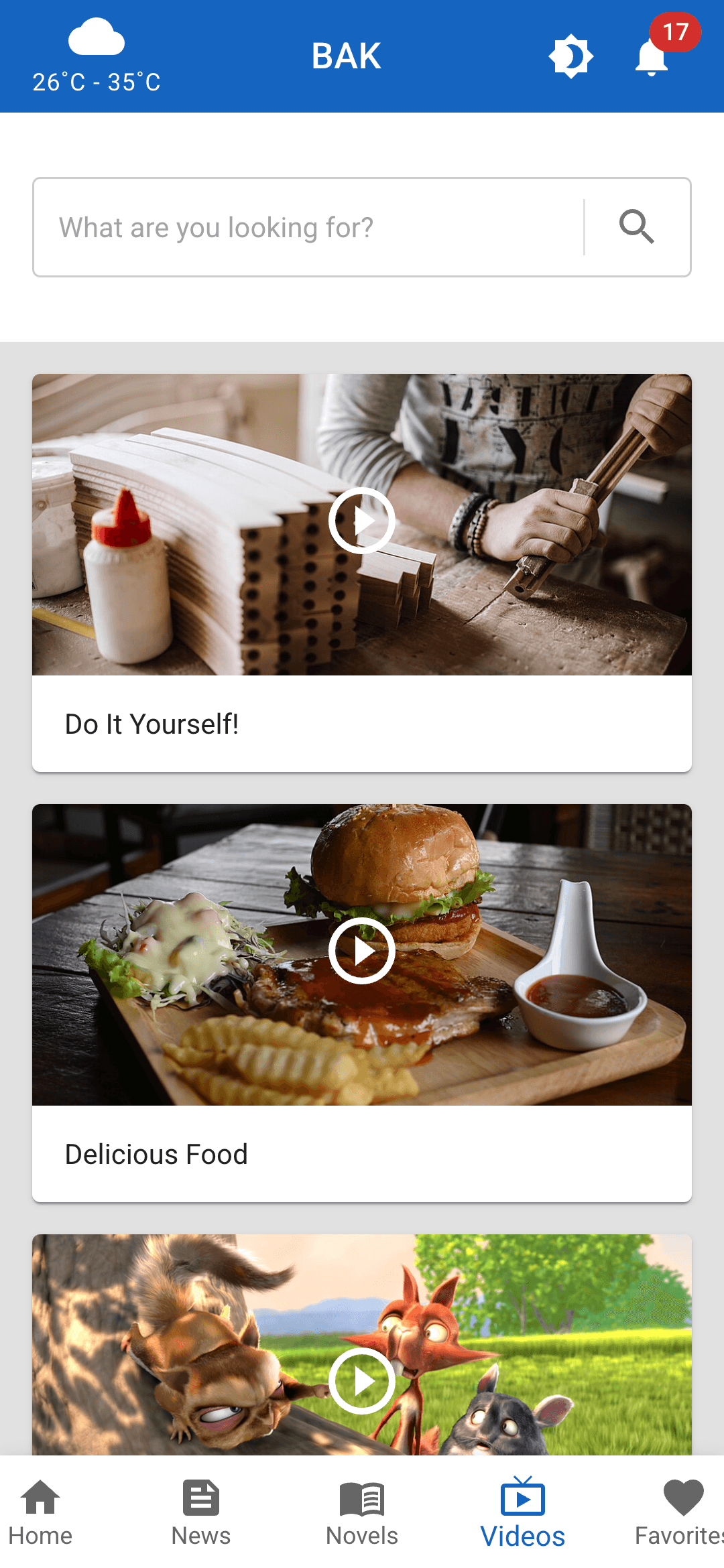 Infotainment videos tab: video cards with thumbnails and play buttons, from a DIY project to a food recipe